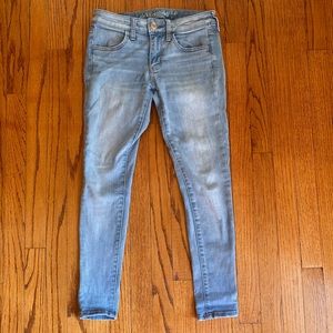 Light wash AE skinny jeans